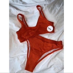 Haute Swimwear ribbed orange bikini set in size L